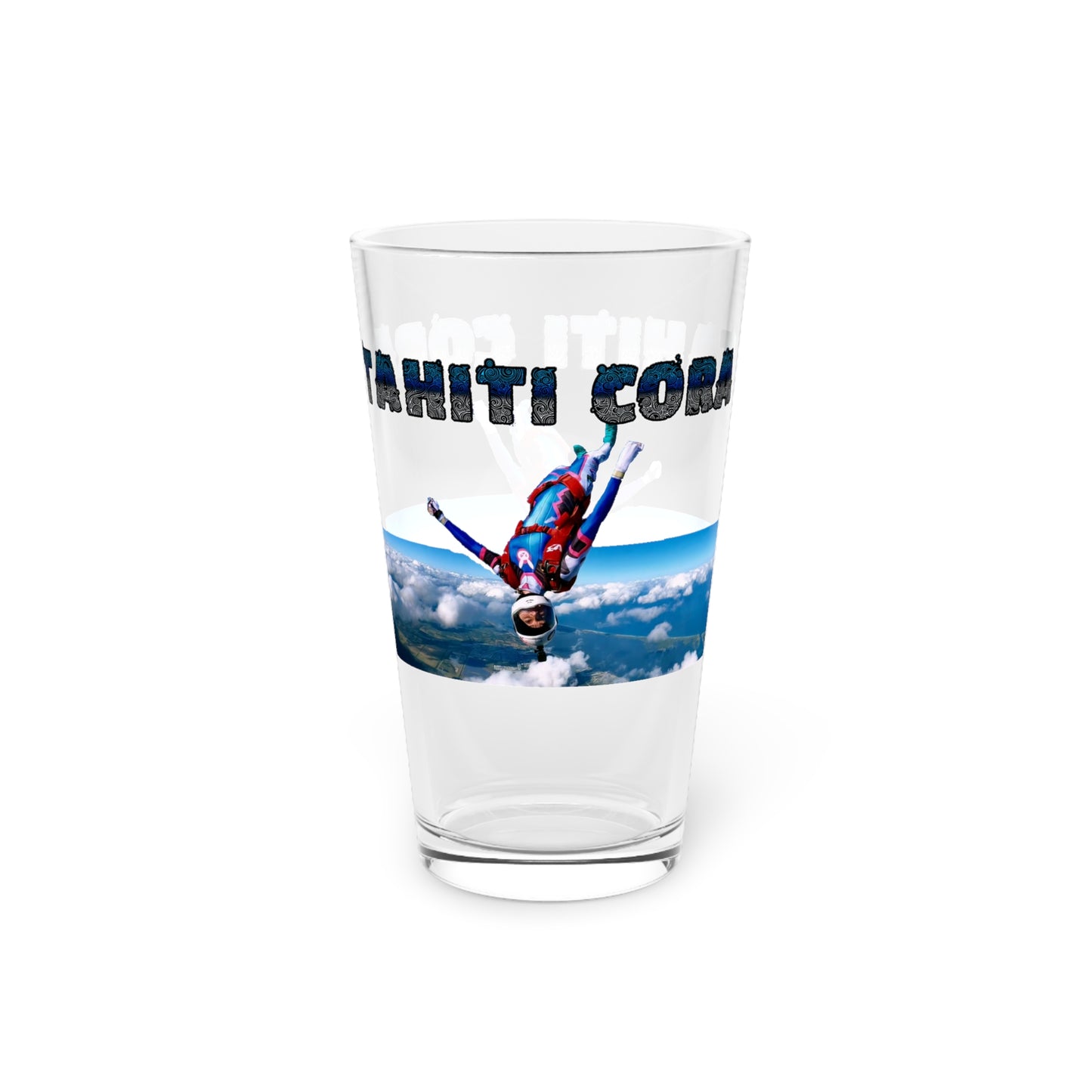 Elevate your glassware collection with our Tahiti Cora Upside Down Skydiving Pint Glass (16oz) - Tahiti Cora #001. Exclusively crafted by Stashbox.ai, this glass features a unique design capturing the thrill of skydiving. Dive into style with this exclusive piece.