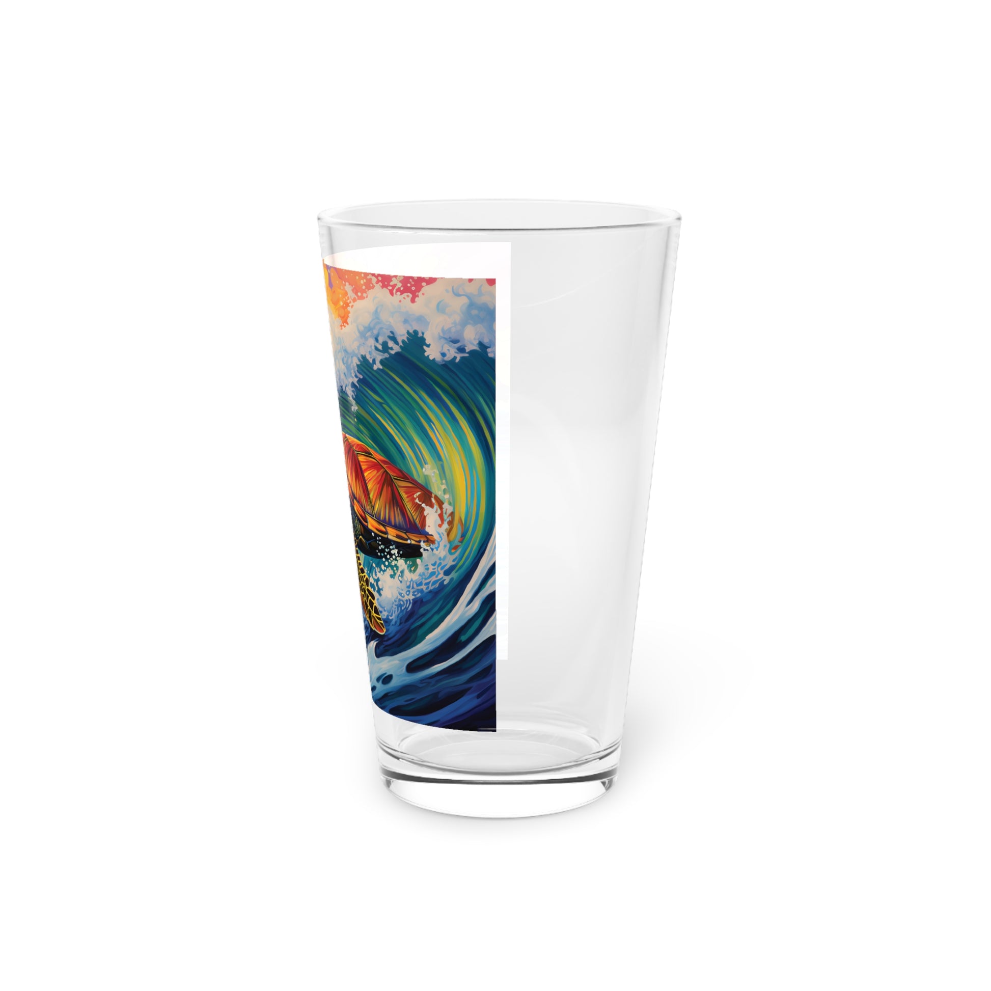 Waves Design #027 Surfing Turtle Pint Glass 16oz: Dive into ocean adventures with our surfing turtle-themed pint glass, a colorful addition to your collection.