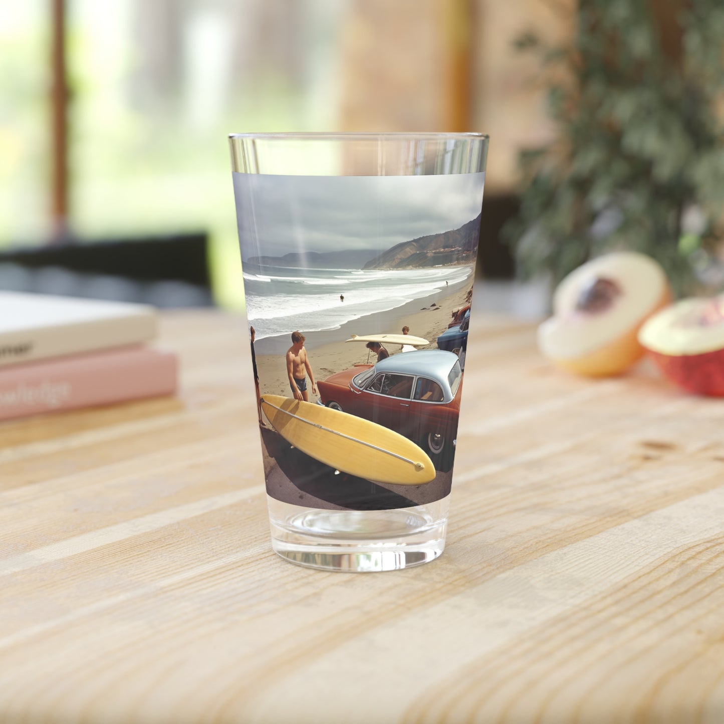 Step into the golden era of surfing with our Design #023 Malibu California 1958 Surf Spot Pint Glass. Your glassware, your slice of surf history, exclusively at Stashbox.ai.