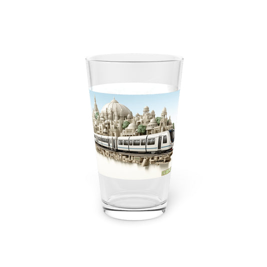 Explore the enigmatic world of Surreal Metro with our Silver & Aquamarine Pint Glass. A blend of organic biomorphism and imaginative characters, this glass is a visual masterpiece. #SurrealArt #StashboxDesign