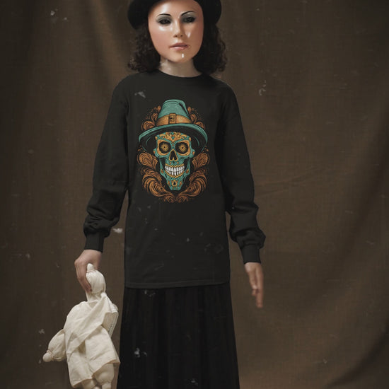 Embrace Mexican Halloween vibes with our Skull and Teal Top Hat Kids Tee! Perfect for young trick-or-treaters, it's a blend of spooky and festive. #HalloweenFashion #MexicanVibes